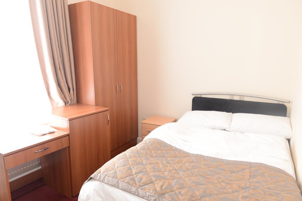 Global Lodge Londres Quarto foto