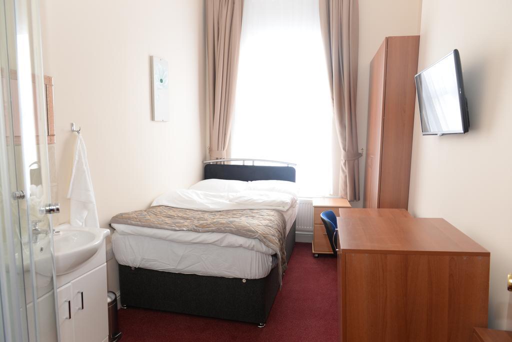 Global Lodge Londres Quarto foto